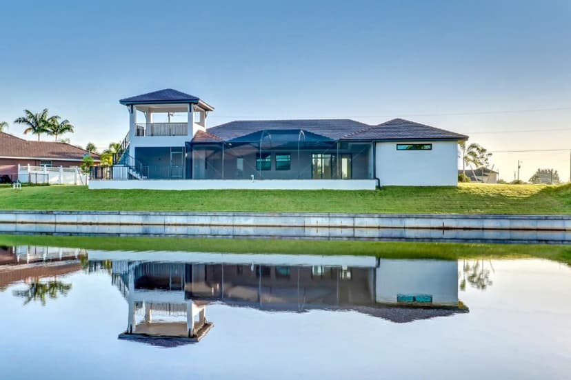 Custom home waterfront rear exterior
