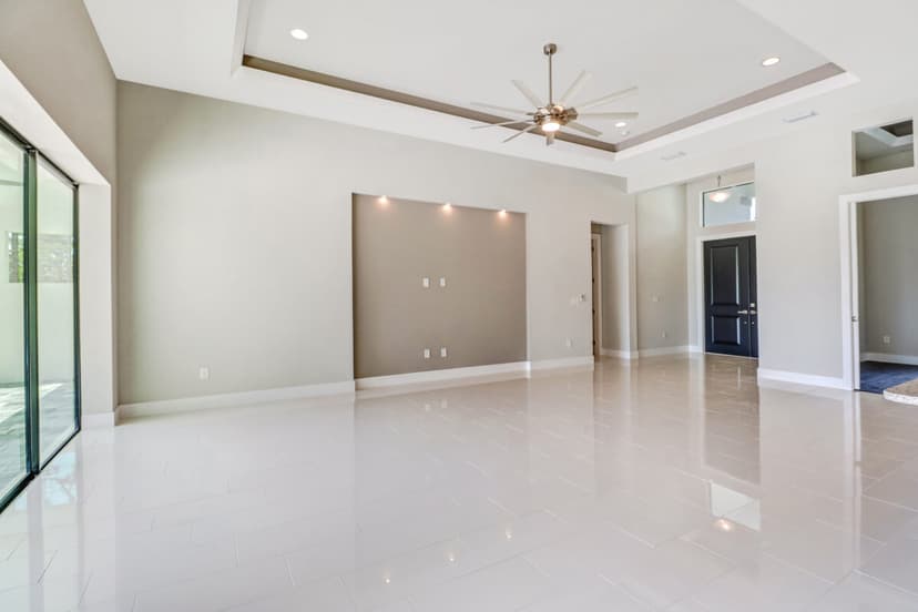 Spica living area with sliding glass doors
