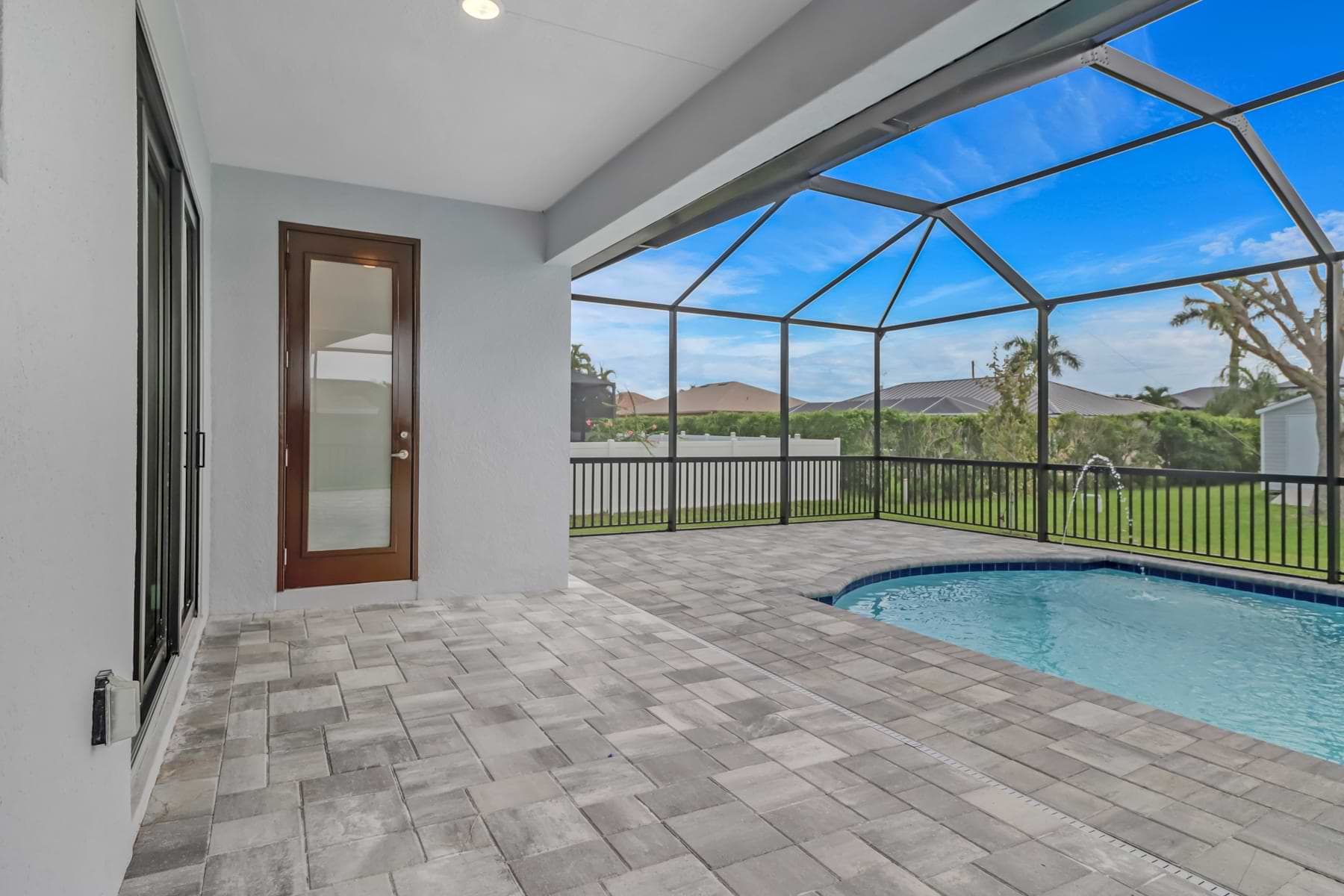 Screened backyard pool at a completed Haven Express home